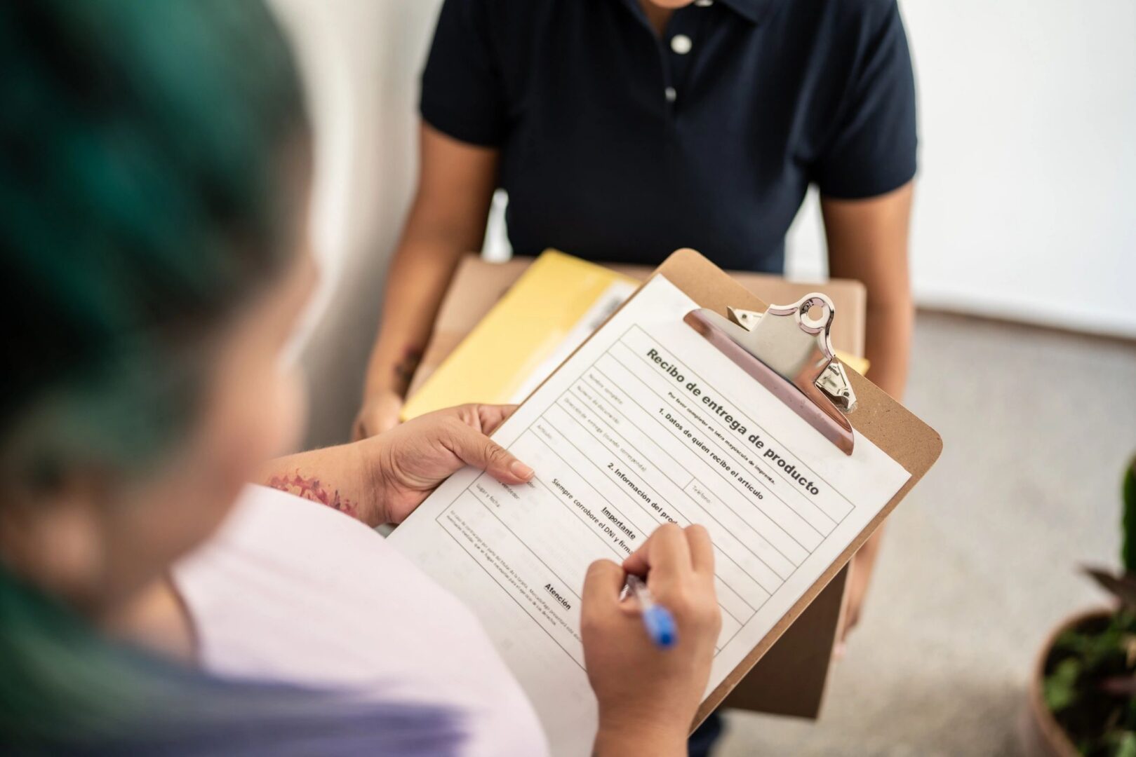 Customer signing service paperwork